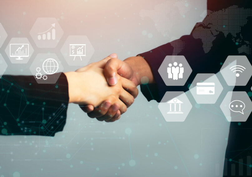 Businessman and Businesswoman making handshake for successful business, investment deal teamwork and partnership business partners. Business and Technology.